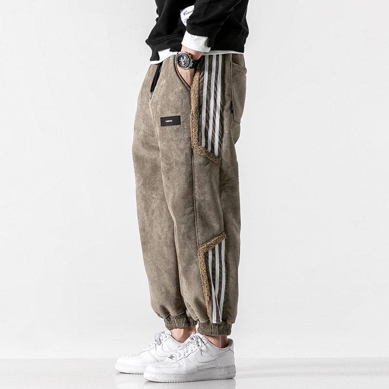 "Herrjoggers i bomull med sidosträckning, trendig stil och elastisk midja för sport och fritid."