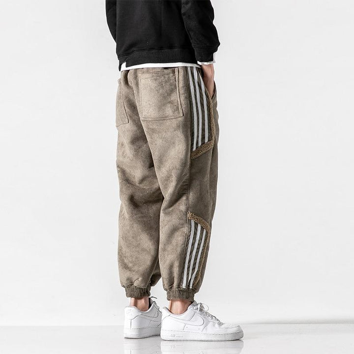 "Herrjoggers i bomull med sidosträckning, trendig stil och elastisk midja för sport och fritid."