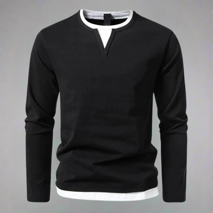 "Herrskjorta med lång ärmar och kontrasterande halsringning, bilden visar skjortans frontvy i en elegant stil."