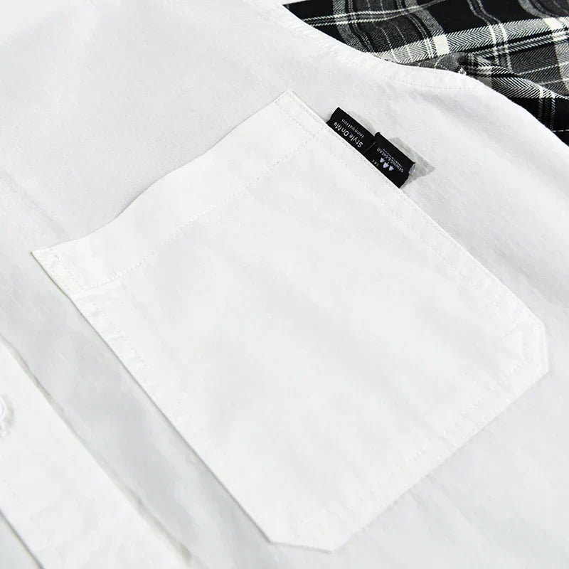 Herrskjorta med rutig design i mjuk bomull, elegant stil och komfort för både formella och informella tillfällen.