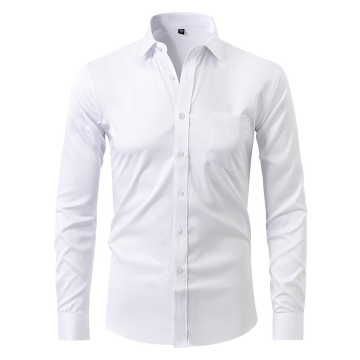 Herrskjorta slim fit vit stretch, spetsig krage, idealisk för smart casual; stilren och bekväm med lättskött tyg.