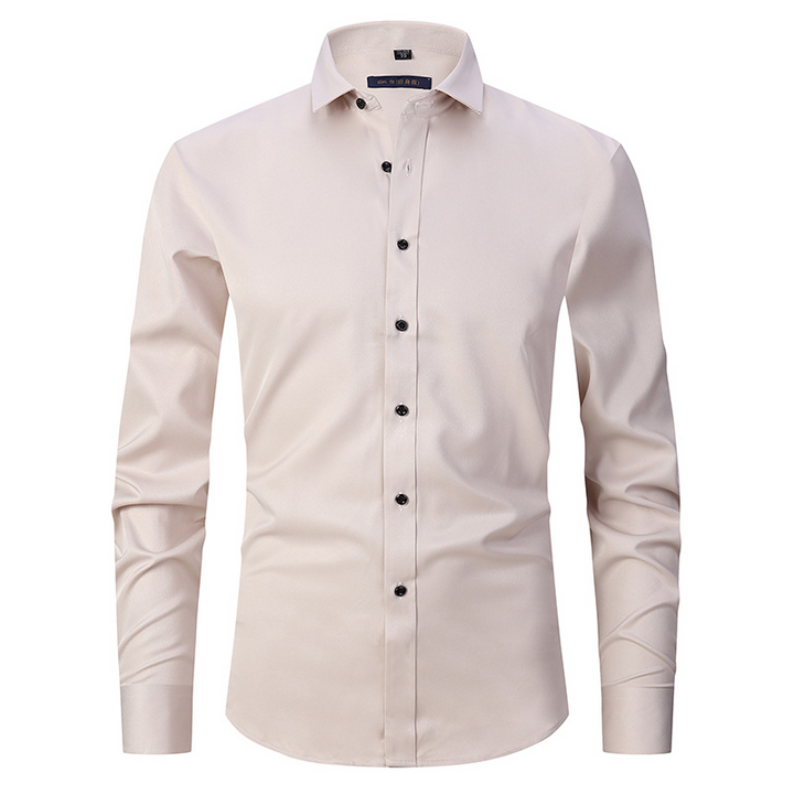 Herrskjorta slim fit vit stretch, spetsig krage, idealisk för smart casual; stilren och bekväm med lättskött tyg.