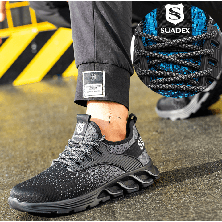 "Herrskor i Kevlar med ståltåkappe, elegant design, halksäker sula, mörk färg, sportiga detaljer."