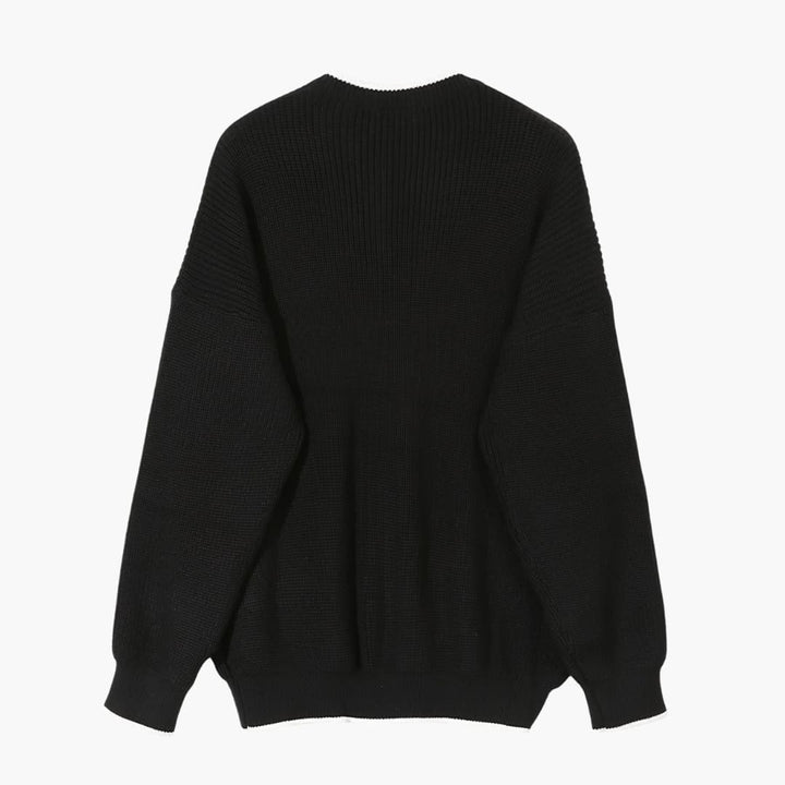 "Herrtröja med halvzip, stickad design och långa ärmar i modern stil, perfekta för både vardag och formella händelser."