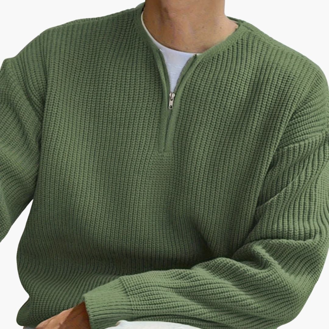"Herrtröja med halvzip, stickad design och långa ärmar i modern stil, perfekta för både vardag och formella händelser."