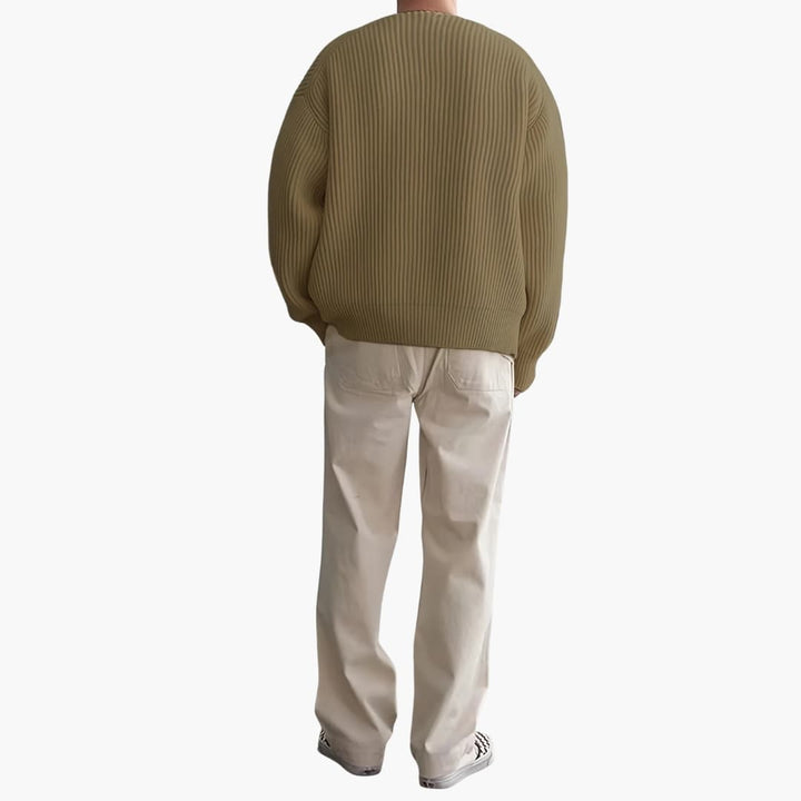 "Herrtröja med halvzip, stickad design och långa ärmar i modern stil, perfekta för både vardag och formella händelser."