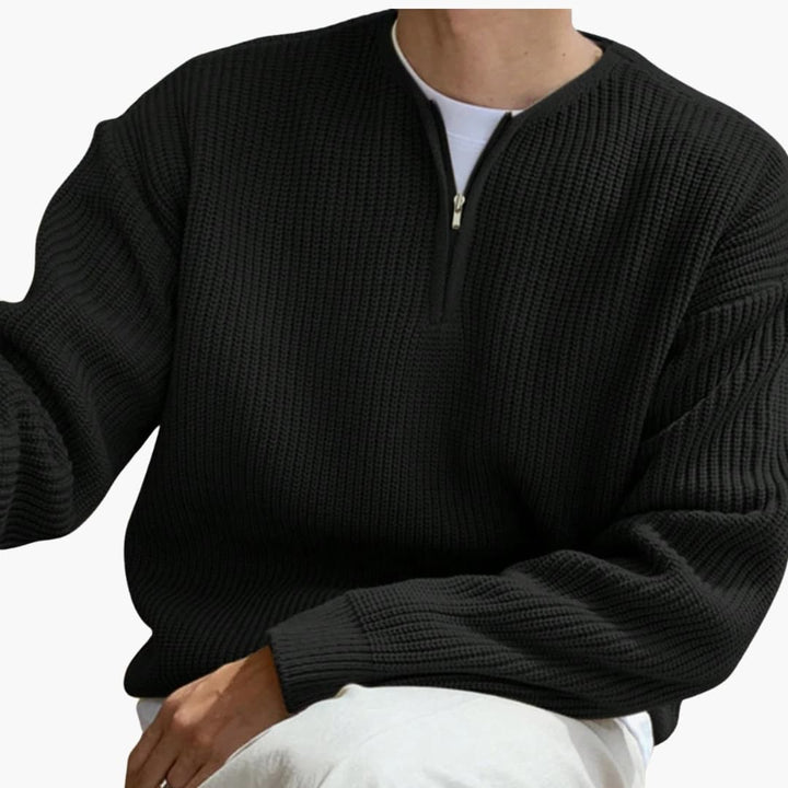"Herrtröja med halvzip, stickad design och långa ärmar i modern stil, perfekta för både vardag och formella händelser."