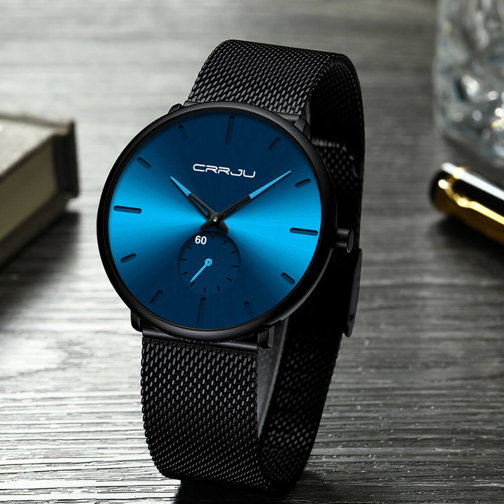 "Herrur med stålblå urtavla, minimalistisk design, matt svart klocka, läderband, stilren accessoar för män."