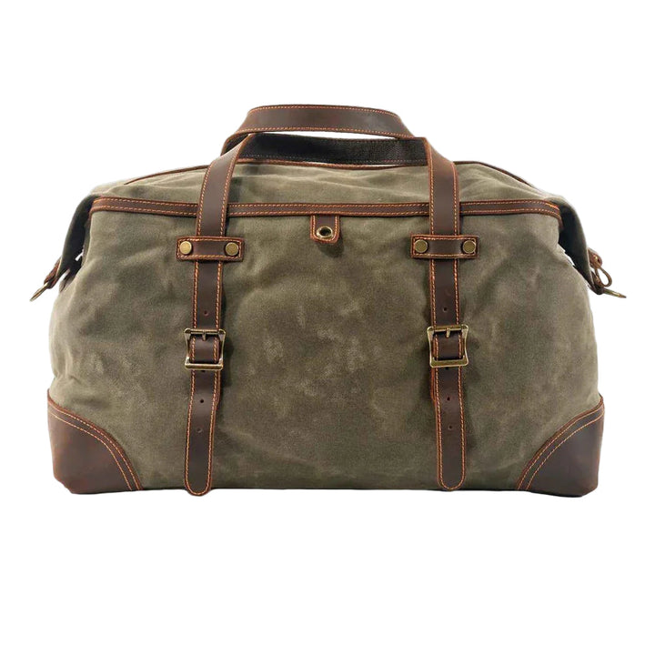 "Herrväska i vintage-design med vaxad canvas och läder, läderhandtag och avtagbar axelrem, perfekt för resor."