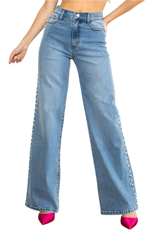 "Höga vida damjeans i medium stone med elegant silhuett och avslappnad look, perfekt för alla tillfällen."