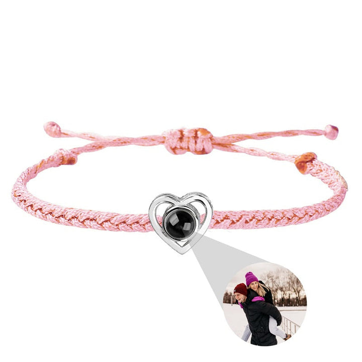 "Hjärtaformad fotoprojektion armband i rostfritt stål för kvinnor, med anpassningsbar projektion och flera färgval."