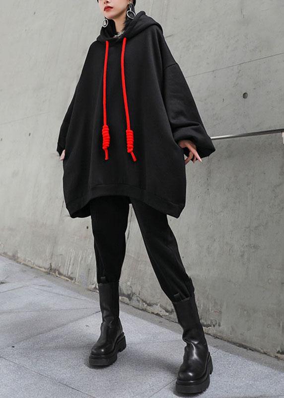 "Hoodie för dam i loose fit med fickor, mjuk bomull, luftig passform, klassisk design för stil och komfort."