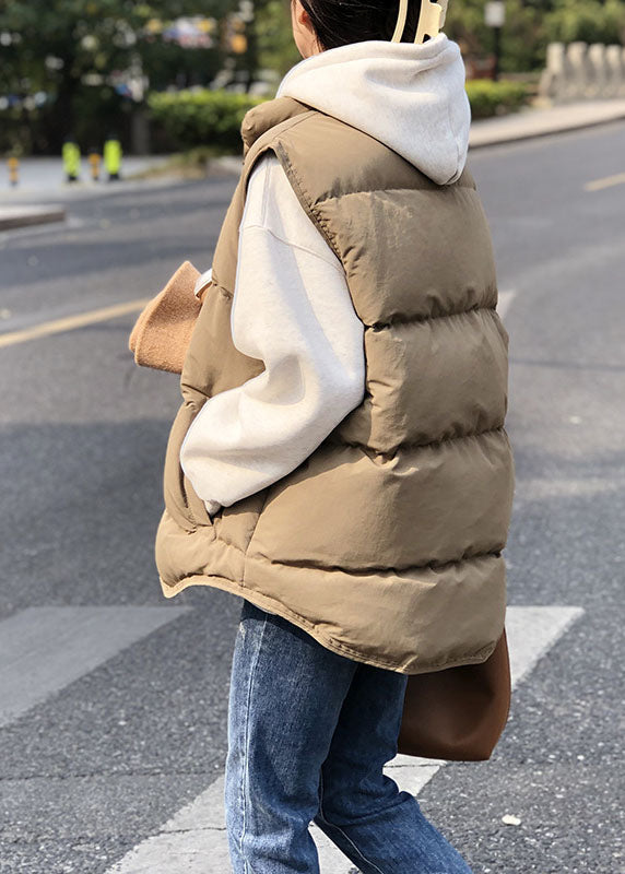 Khakifärgad dam puffer väst med ståkrage, vinterdesign, lös passform, ger värme och elegans, perfekt för lager-på-lager.