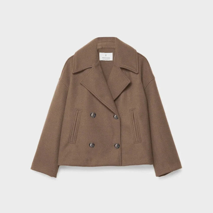 "Kort dubbelknäppt kvinnor kavaj i figursydd stil, modern passform och elegant design, perfekt för chic klädsel."
