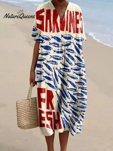 "Kortärmad kvinnors plus size klänning, marint mönster, fickor, lätt material, somrig stil och komfort."