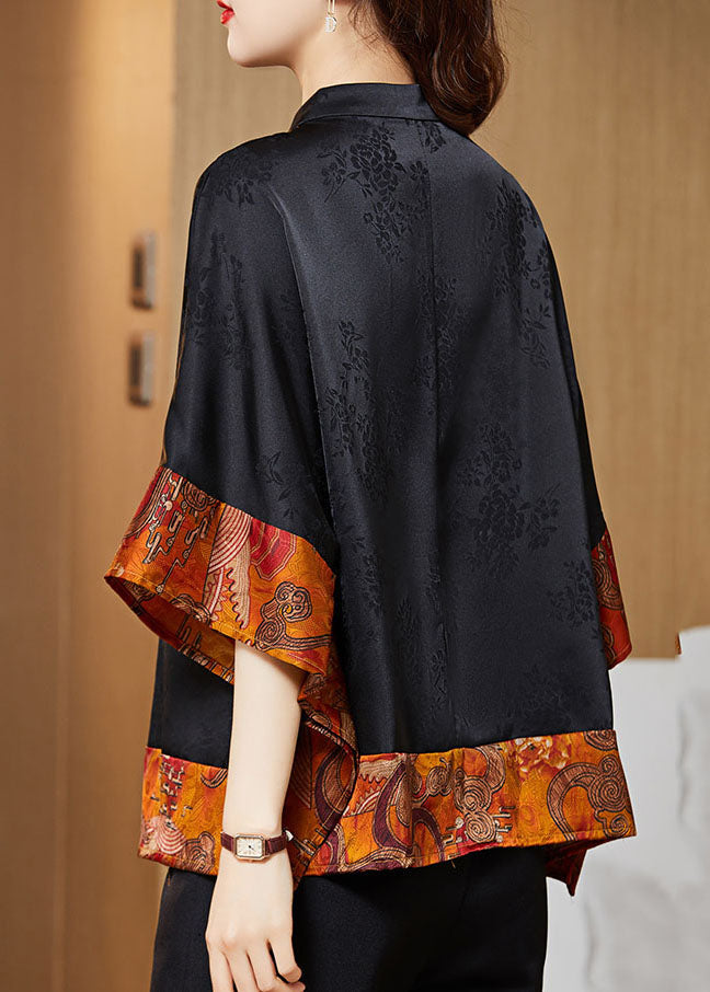 Kvinna Vintage Asymmetrisk Skjorta med Mandarin Krage, batwing ärmar, perfekt för stil och komfort, unikt mönster.