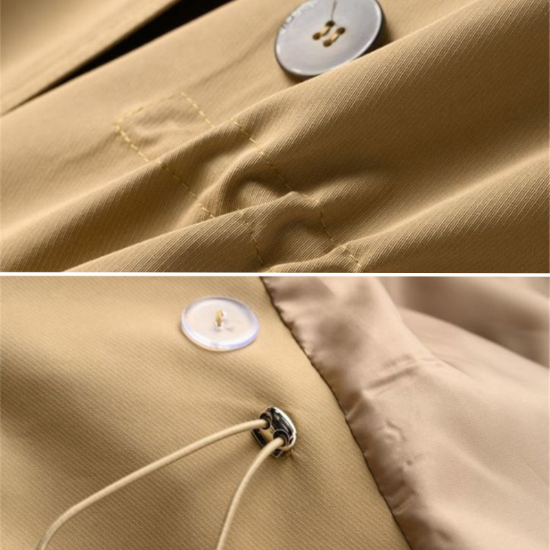 "Kvinna vintage trench coat, dubbelknäppt, nylon-bomull, elegant design, lång silhuett, klassisk look, slitstarkt material."