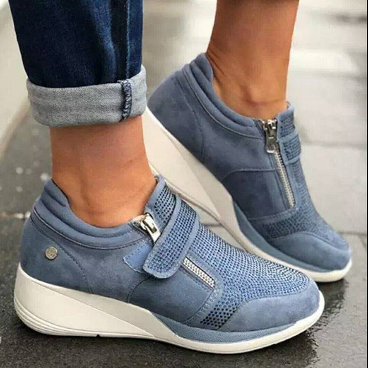 Kvinnor dragkedja platform sneakers i vitt PU-läder, ergonomisk design med andningsaktivt foder och unik hälstruktur.