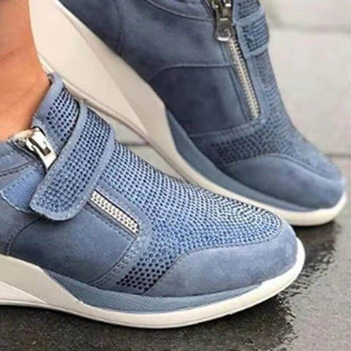 Kvinnor dragkedja platform sneakers i vitt PU-läder, ergonomisk design med andningsaktivt foder och unik hälstruktur.