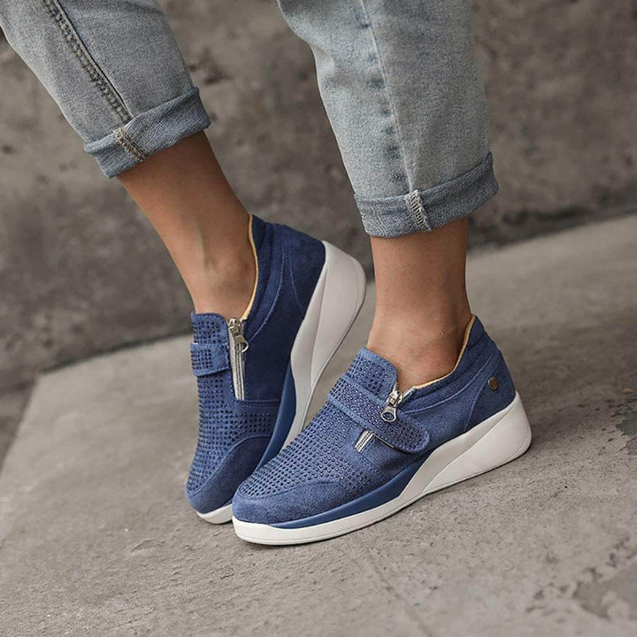 Kvinnor dragkedja platform sneakers i vitt PU-läder, ergonomisk design med andningsaktivt foder och unik hälstruktur.