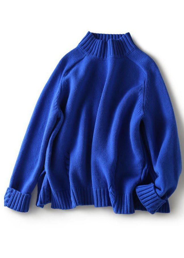 "Kvinnor vintage blå stickad tröja med öppen sida i ullblandning, loose fit, modern och stilren design."