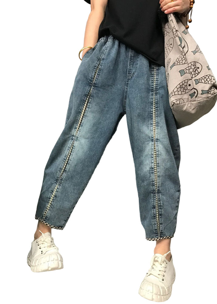 "Kvinnors Boho Patchwork Denim Byxor med elastisk midja, i lekfull design, perfekt för vår- och sommarsäsong."