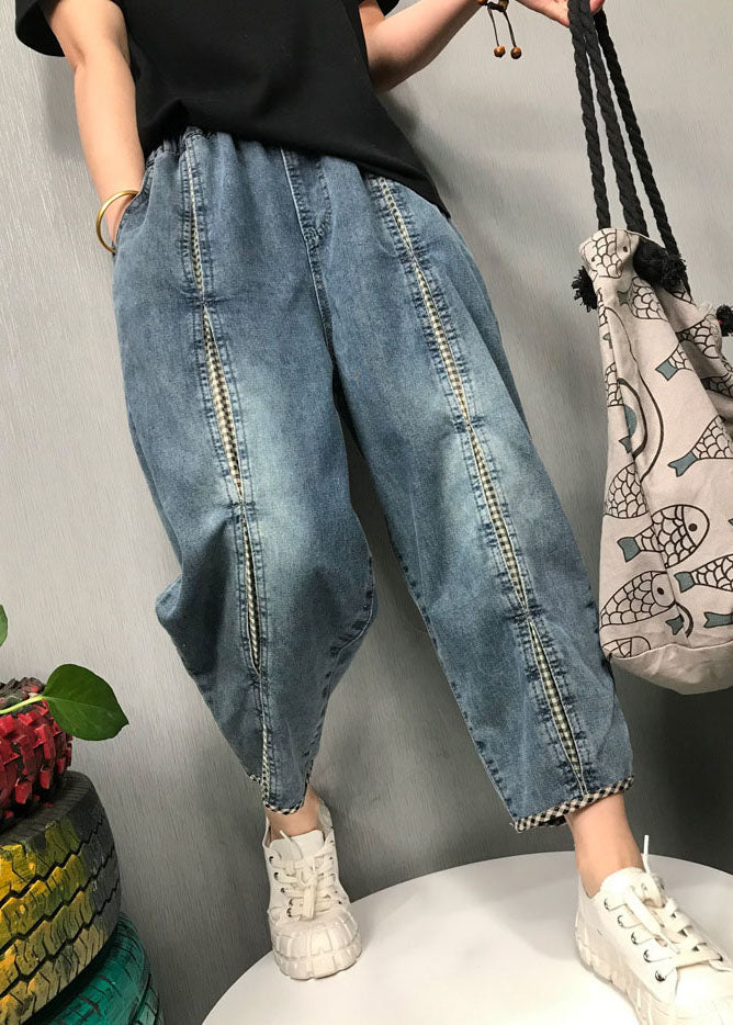 "Kvinnors Boho Patchwork Denim Byxor med elastisk midja, i lekfull design, perfekt för vår- och sommarsäsong."
