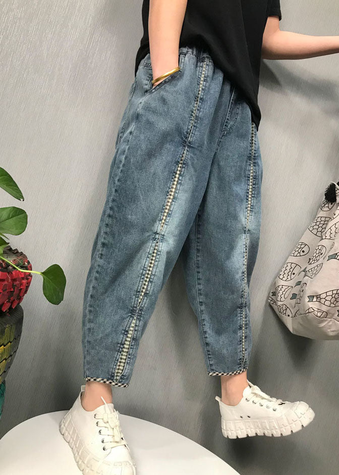 "Kvinnors Boho Patchwork Denim Byxor med elastisk midja, i lekfull design, perfekt för vår- och sommarsäsong."