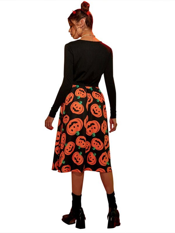 "Kvinnors Halloween midi klänning med pumpamönster, svart bas med orange detaljer, mjuk och bekväm för höstfest."