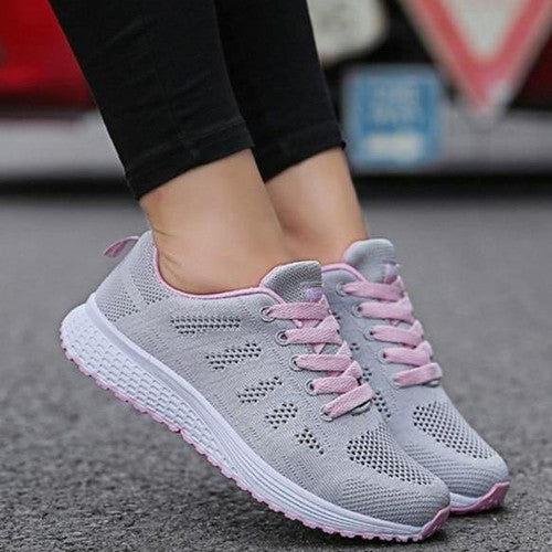 "Kvinnors andningsbara sneakers, lätta meshovandel, elegant vita sulor, modern stil och funktionalitet."
