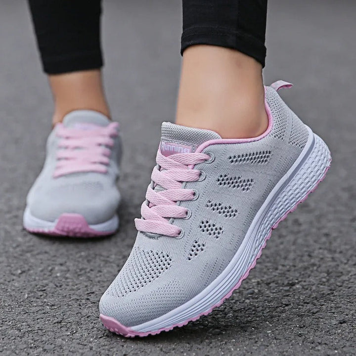 "Kvinnors andningsbara sneakers, lätta meshovandel, elegant vita sulor, modern stil och funktionalitet."