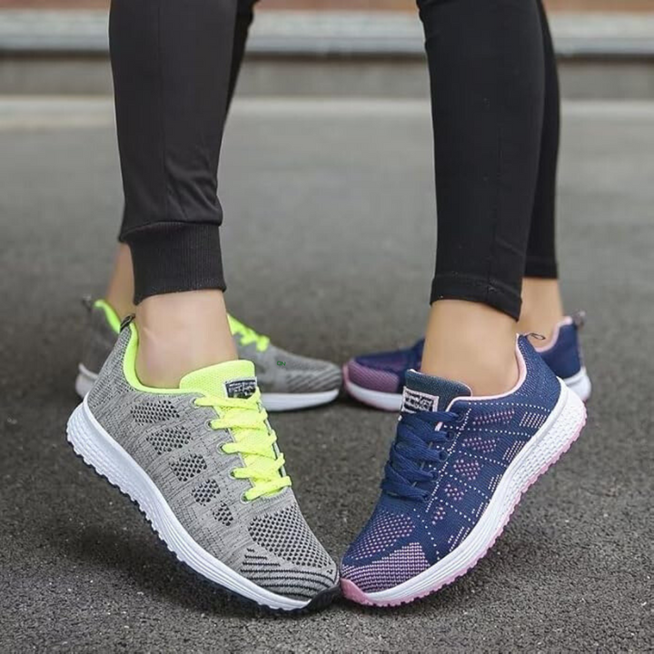"Kvinnors andningsbara sneakers, lätta meshovandel, elegant vita sulor, modern stil och funktionalitet."