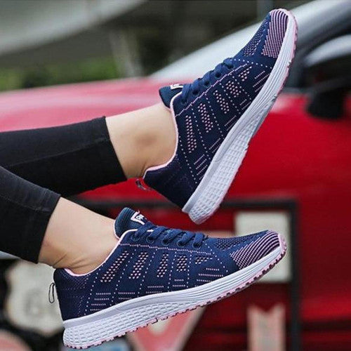 "Kvinnors andningsbara sneakers, lätta meshovandel, elegant vita sulor, modern stil och funktionalitet."