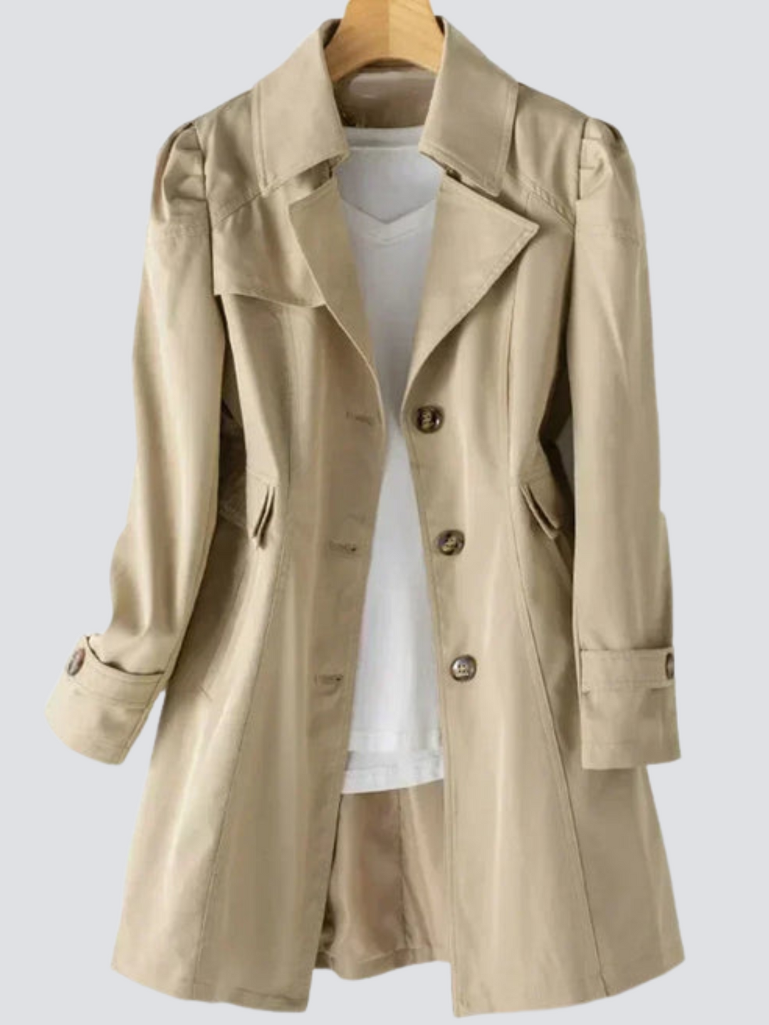 Kvinnors beige trenchcoat med skräddarsydd design, perfekt för både vår och höst. Elegant och smickrande kappa.
