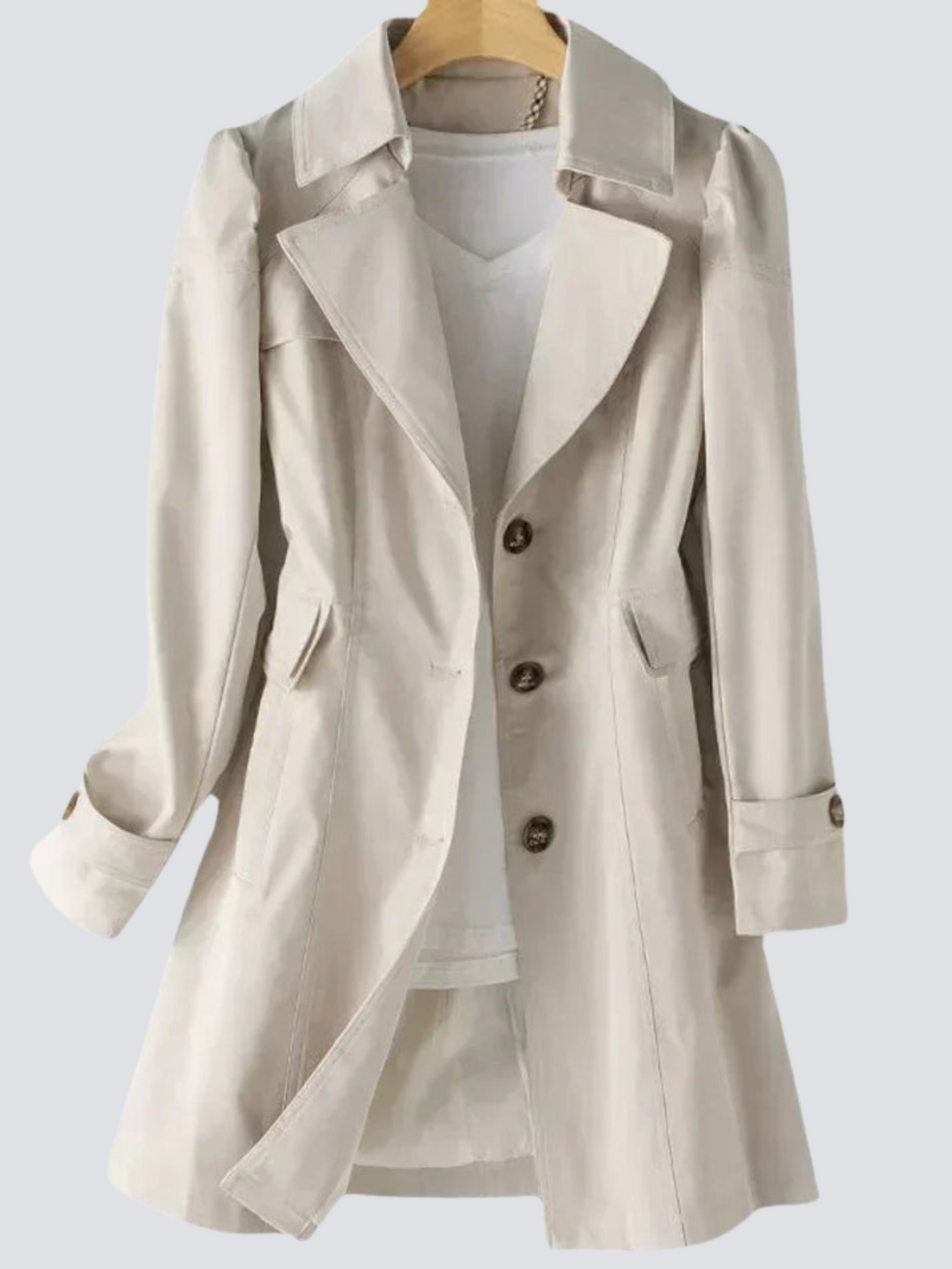 Kvinnors beige trenchcoat med skräddarsydd design, perfekt för både vår och höst. Elegant och smickrande kappa.