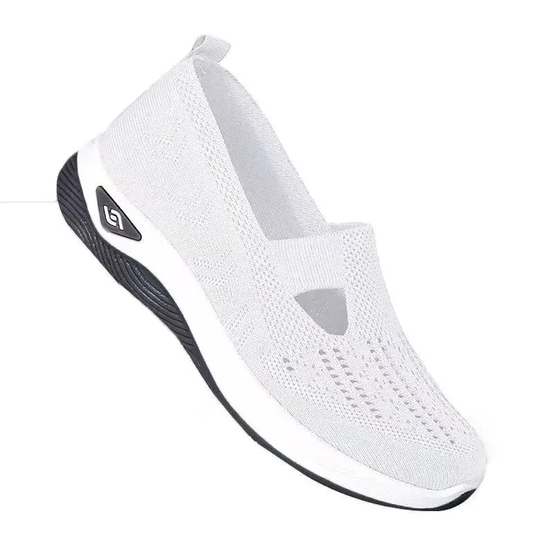"Kvinnors blå slip-on sneakers, lättviktig, andningsbart material, med stödjande innersula och halkfri yttersula."