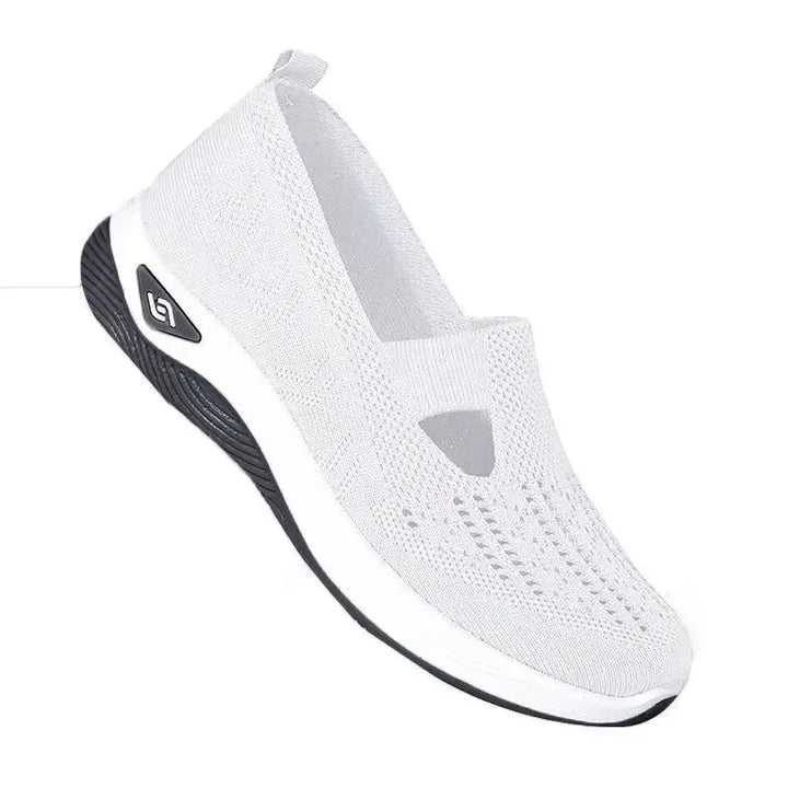 "Kvinnors blå slip-on sneakers, lättviktig, andningsbart material, med stödjande innersula och halkfri yttersula."