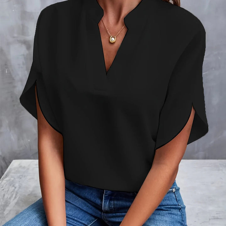 Elegant damblus med flödande ärmar och V-hals i gul