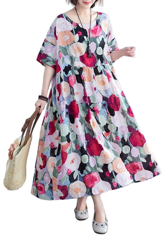 "Kvinnors bohemisk blommig maxi klänning med halværmar, luftigt tyg för sommarstil. Perfekt till både dag- och kvällsevent."