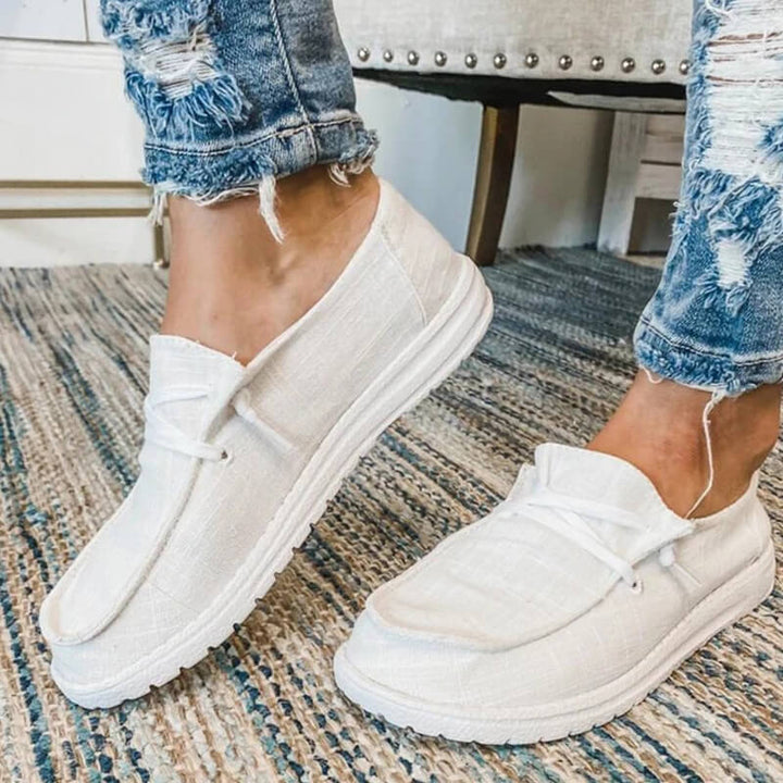 "Kvinnors canvas snörade loafers i olika färger, trendiga och bekväma med dämpad innersula och andningsbar design."