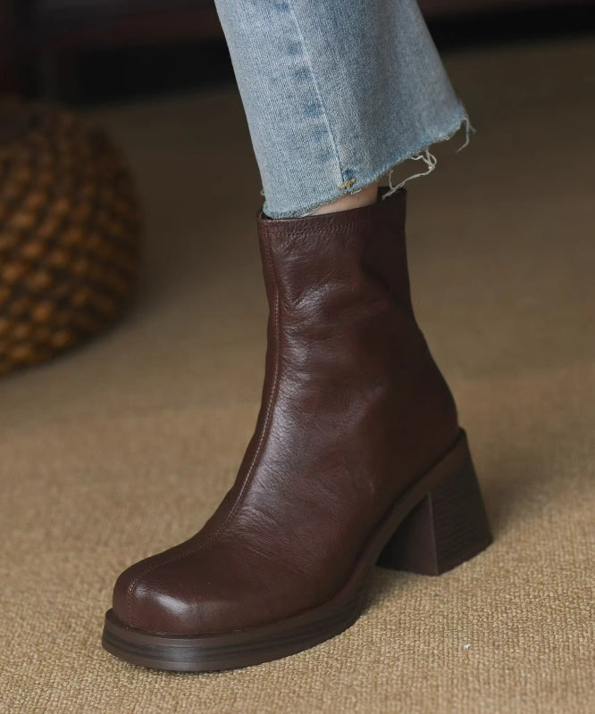 "Kvinnors chunky heel stövlar i brun/svart med dragkedja, trendig design, perfekt för både vardag och festliga tillfällen."