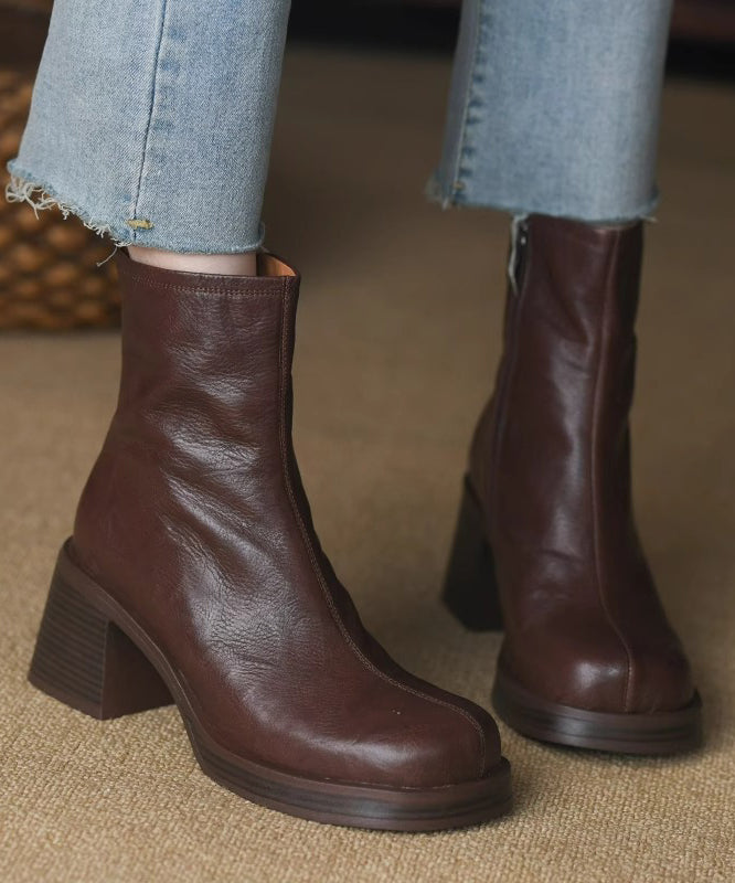 "Kvinnors chunky heel stövlar i brun/svart med dragkedja, trendig design, perfekt för både vardag och festliga tillfällen."