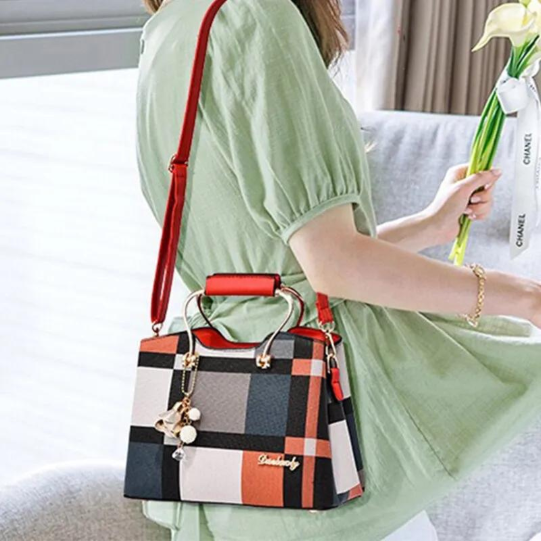 Kvinnors crossbody-väska i rutigt mönster, tillverkad i PU-läder, med justerbar rem och elegant design.