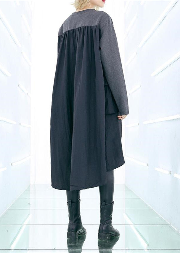 "Kvinnors elegant grå baggy klänning med lång ärm i mjukt bomullstyg, perfekt för stil och komfort."