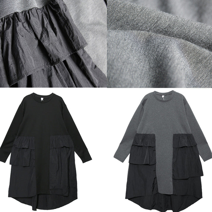 "Kvinnors elegant grå baggy klänning med lång ärm i mjukt bomullstyg, perfekt för stil och komfort."