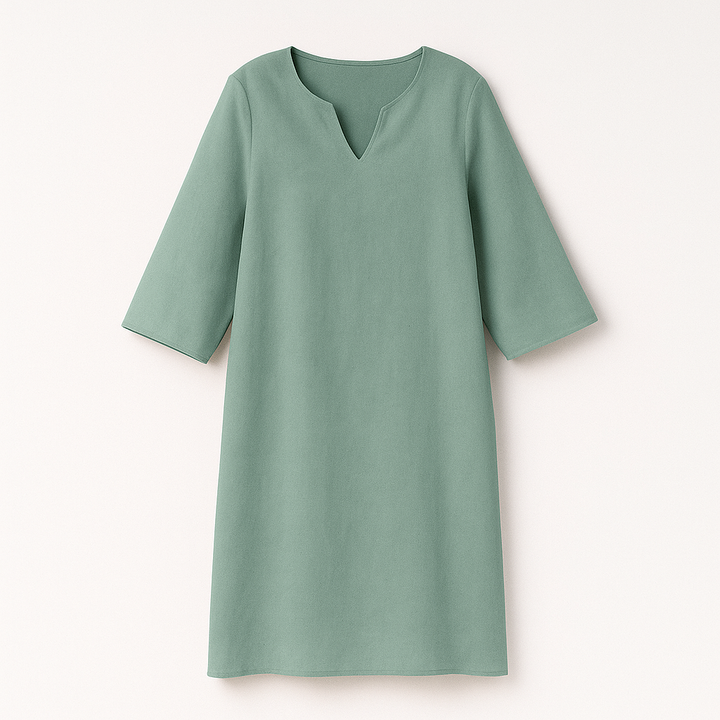 "Kvinnors elegant höstklänning med v-ringning, feminin stil, stilren design, perfekt för vardag och fest."