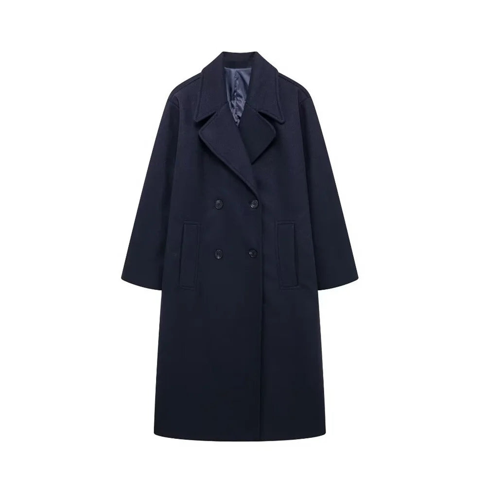 "Kvinnors elegant vinterkappa, hållbart material, tidlös design, strukturerade axlar, perfekt för kalla dagar."