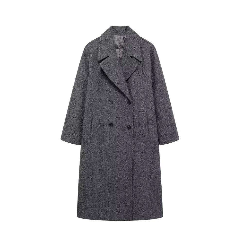 "Kvinnors elegant vinterkappa, hållbart material, tidlös design, strukturerade axlar, perfekt för kalla dagar."