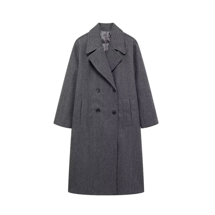 "Kvinnors elegant vinterkappa, hållbart material, tidlös design, strukturerade axlar, perfekt för kalla dagar."