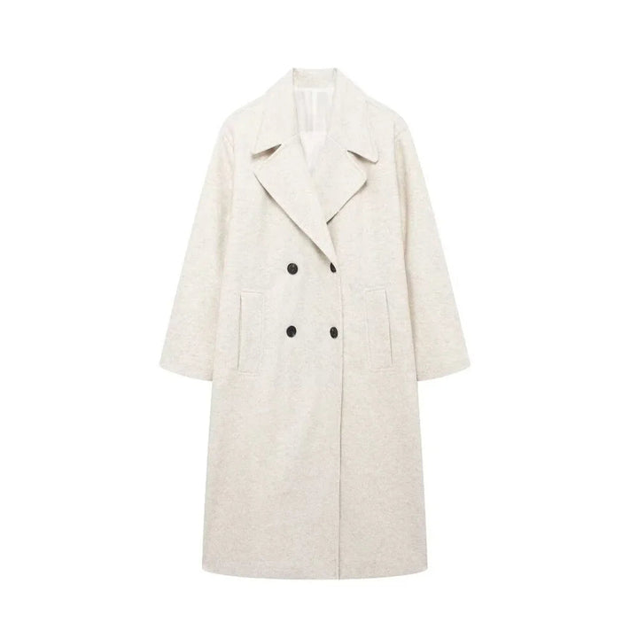 "Kvinnors elegant vinterkappa, hållbart material, tidlös design, strukturerade axlar, perfekt för kalla dagar."